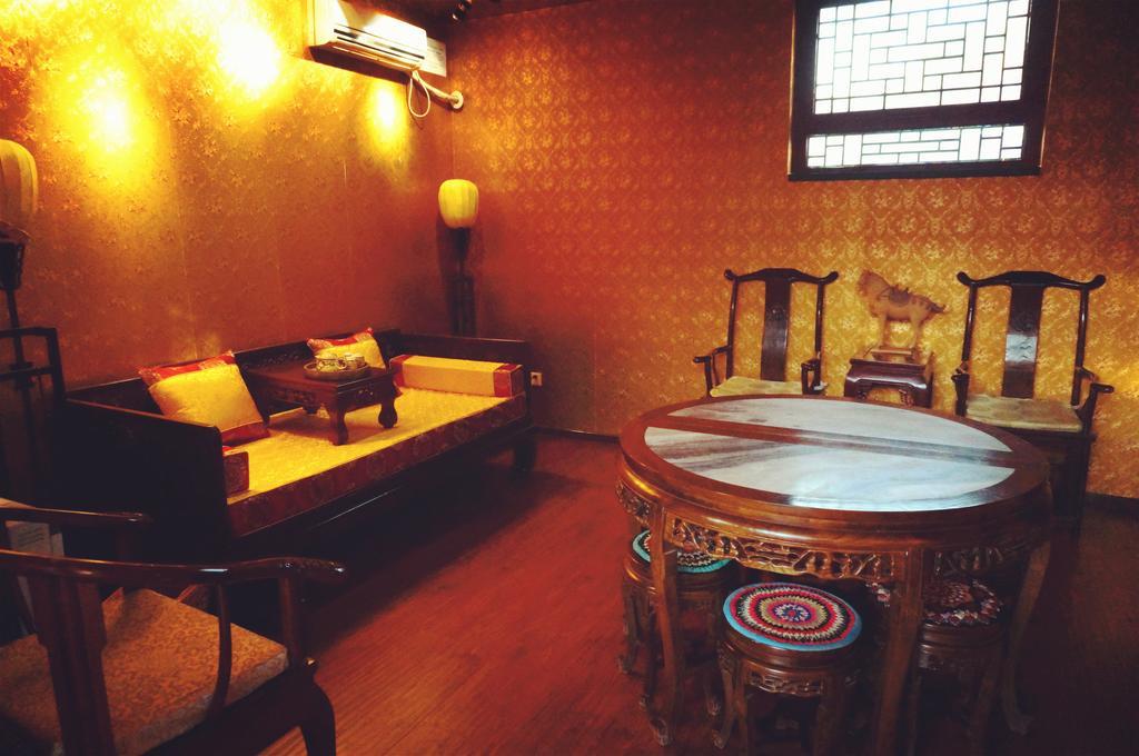 Templeside Deluxe Hutong Hotel Pekín Habitación foto